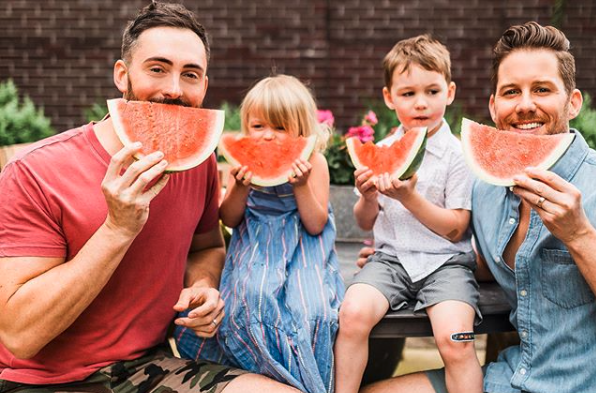 Dustin Smith and Burton Buffaloe with their twins